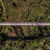 Aerial view of cyclists crossing Doube's Trestle Bridge on the Kawartha Trans Canada Trail