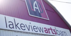 Closeup of sign reading "lakeview arts barn"