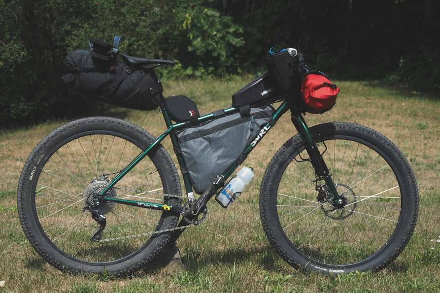 A mountain bike loaded with gear and supplies