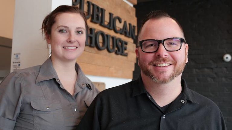 Chefs Brad Watt and Rebecca Burke stand in the foyer of the Publican House Brew Pub