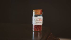 Vial of True Saffron on a black background