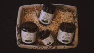 A basket containing black currant products from Popham Lane Farm