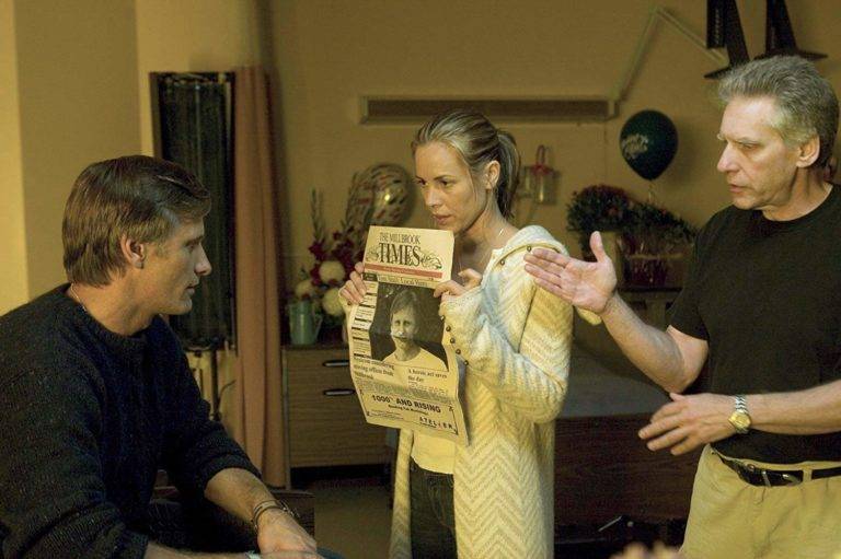 Production still from A History Violence with Viggo Mortensen, Maria Bello, and David Cronenberg