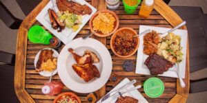 A table covered in a barbecue feast