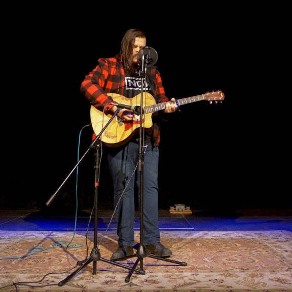 Cale Crowe performs onstage at Victoria Hall
